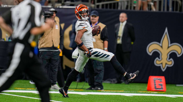 Cincinnati Bengals wide receiver Ja'Marr Chase (1) runs into the end zone for a touchdown with 2:10 remaining in the fourth quarter during an NFL Week 6 game against the New Orleans Saints, Sunday, Oct. 16, 2022, at Mercedes-Benz Superdome in New Orleans. Cincinnati Bengals At New Orleans Saints Oct 16 044